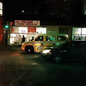 Shot of a Chinese restaurant and old cab edited to look like a scence from 70s NY